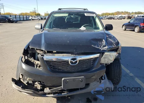 2010 Mazda Tribute I z USA, uszkodzony, nr VIN 4F2CY0C70AKM02556